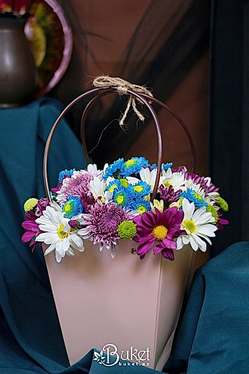 Bouquet of wild flowers in a box