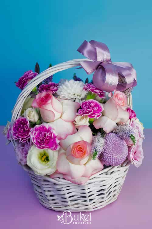 Rose composition in a wicker basket